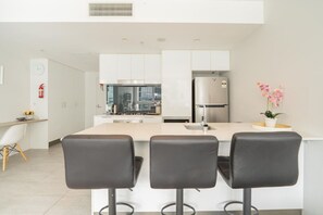 Fridge, microwave, stovetop, cookware/dishes/utensils