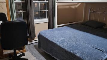 Family Room | Blackout drapes, iron/ironing board, travel crib, free WiFi