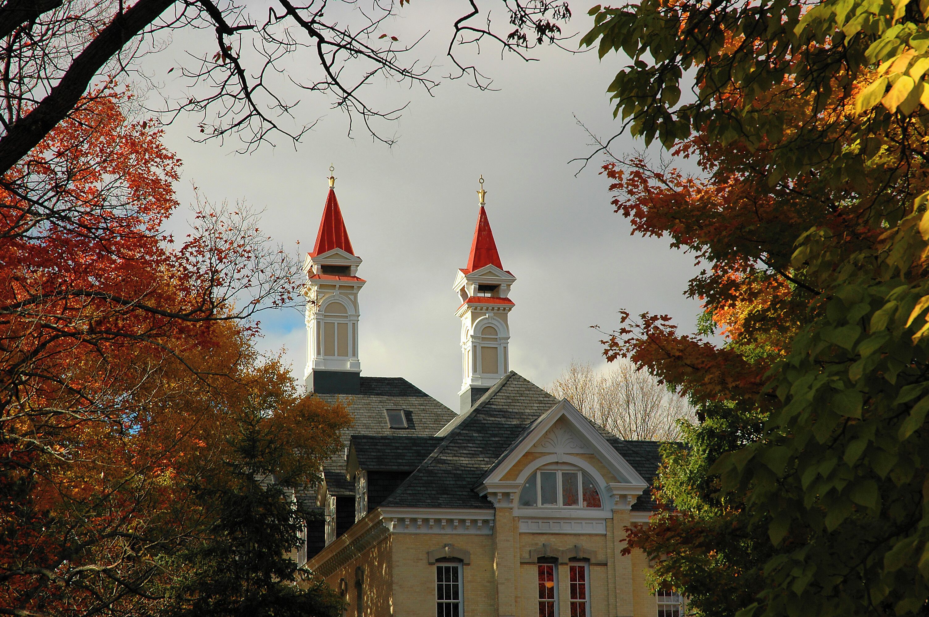 A building with two prominent towers and a classic architectural style.
