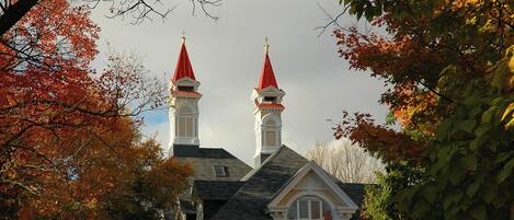 A building with two prominent towers and a classic architectural style.