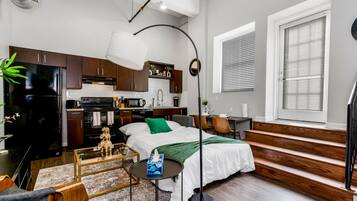 1 bedroom, desk, iron/ironing board, travel crib