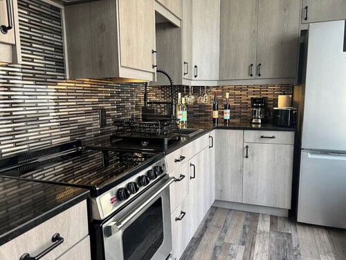 Lakefront vacation home with kitchen and balcony