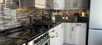 Lakefront vacation home with kitchen and balcony