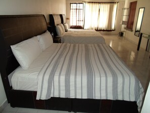 Family Suite, Multiple Beds, Kitchen | Down comforters, free WiFi, bed sheets - Hotel María Bonita (Tlaxcala)