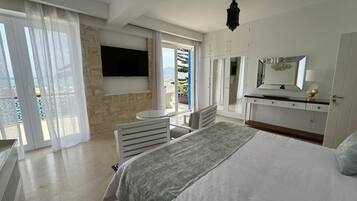 Junior Suite | 1 bedroom, minibar, in-room safe, individually decorated