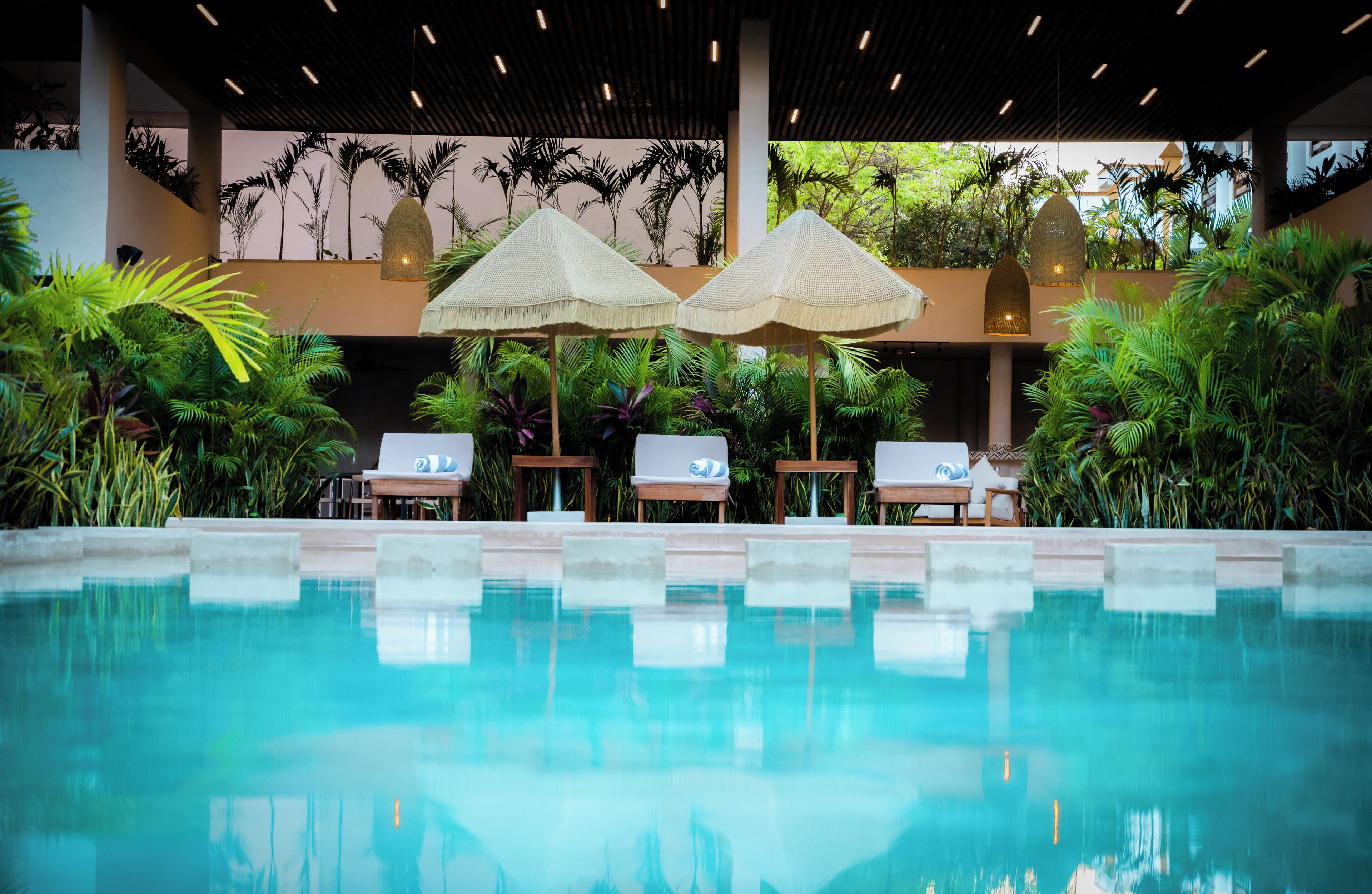 2 outdoor pools, open 7:00 AM to 11:30 PM, pool umbrellas, pool loungers