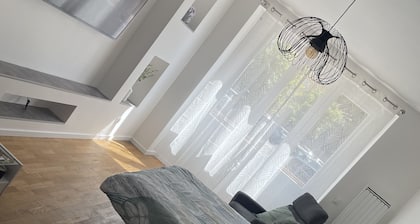 Appartement du lion, à 10 minutes du centre ville, stationnement idéal!