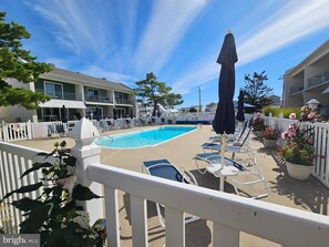 Outdoor pool, a heated pool - Beach block 2 bed/2.1 bath TownHome with heated pool. (Ship Bottom)