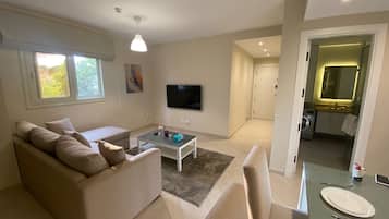 Suite | Living area | 50-inch Smart TV with satellite channels