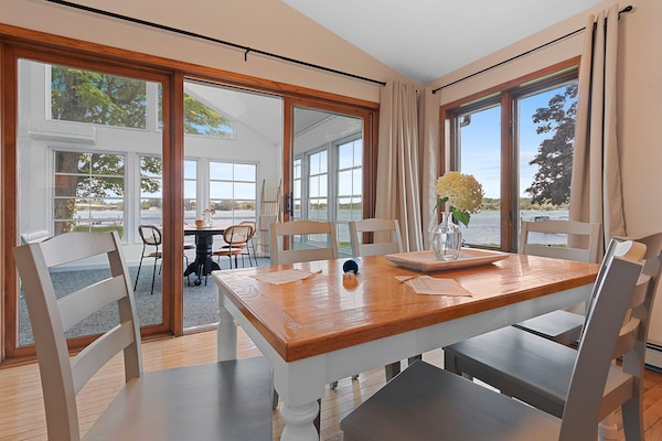 Dining space for 6 with a view of the water.