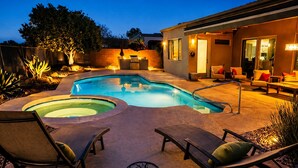 A swimming pool with hot tub, outdoor seating, and a barbecue area. - 🌵 Anthem Country Club Retreat.  Heated Saltwater Pool, Spa, Casita & Office. (New River)