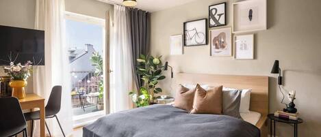 1 habitación, tabla de planchar con plancha, cuna de viaje y wifi