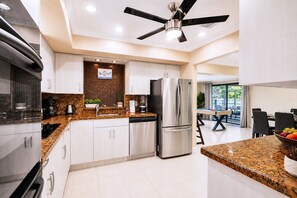 Coffee/tea maker, fridge, microwave, oven
