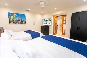 4 bedrooms, desk, iron/ironing board, travel cot