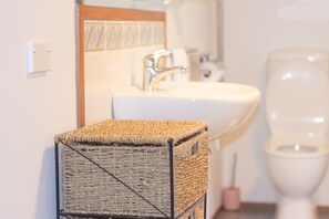Separate tub and shower, hair dryer, towels, soap