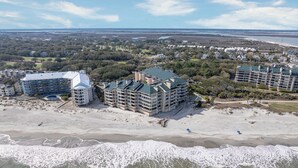 A coastal hotel with multiple buildings, a beach, and a view of the ocean. - Oceanfront Ocean Club Villa in Wild Dunes w/Hot Tub & Community Pool! *Unit 1212* (Isle Of Palms)