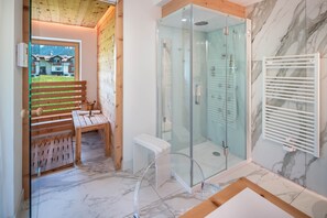 Shower, hair dryer, towels