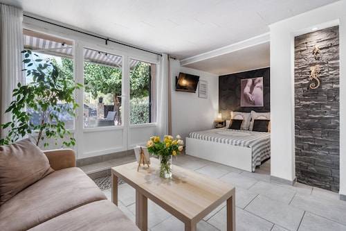 Villa Nui - Appartement tout  confort- Terrasse d'été et parking privé.