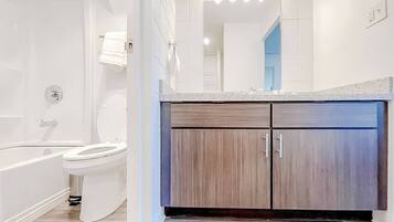 Hair dryer, towels, soap, shampoo