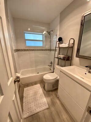 Hair dryer, towels, soap, shampoo