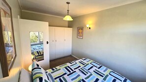 2 habitaciones, tabla de planchar con plancha, wifi y ropa de cama