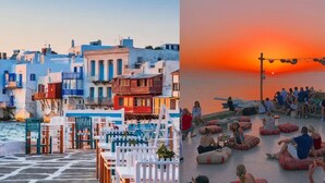 Un poble costaner amb edificis de colors i una zona al passeig marítim.