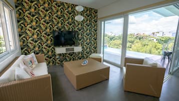 Pihala Villa | Living area | 55-inch Smart TV with cable channels