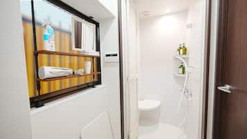 Hair dryer, towels, soap, shampoo