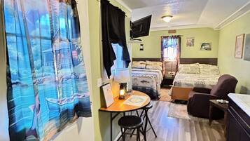 Cabaña Deluxe, 2 camas Queen size, cocineta, planta baja | Ropa de cama de alta calidad y camas con pillow-top