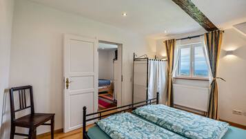 2 habitaciones y ropa de cama