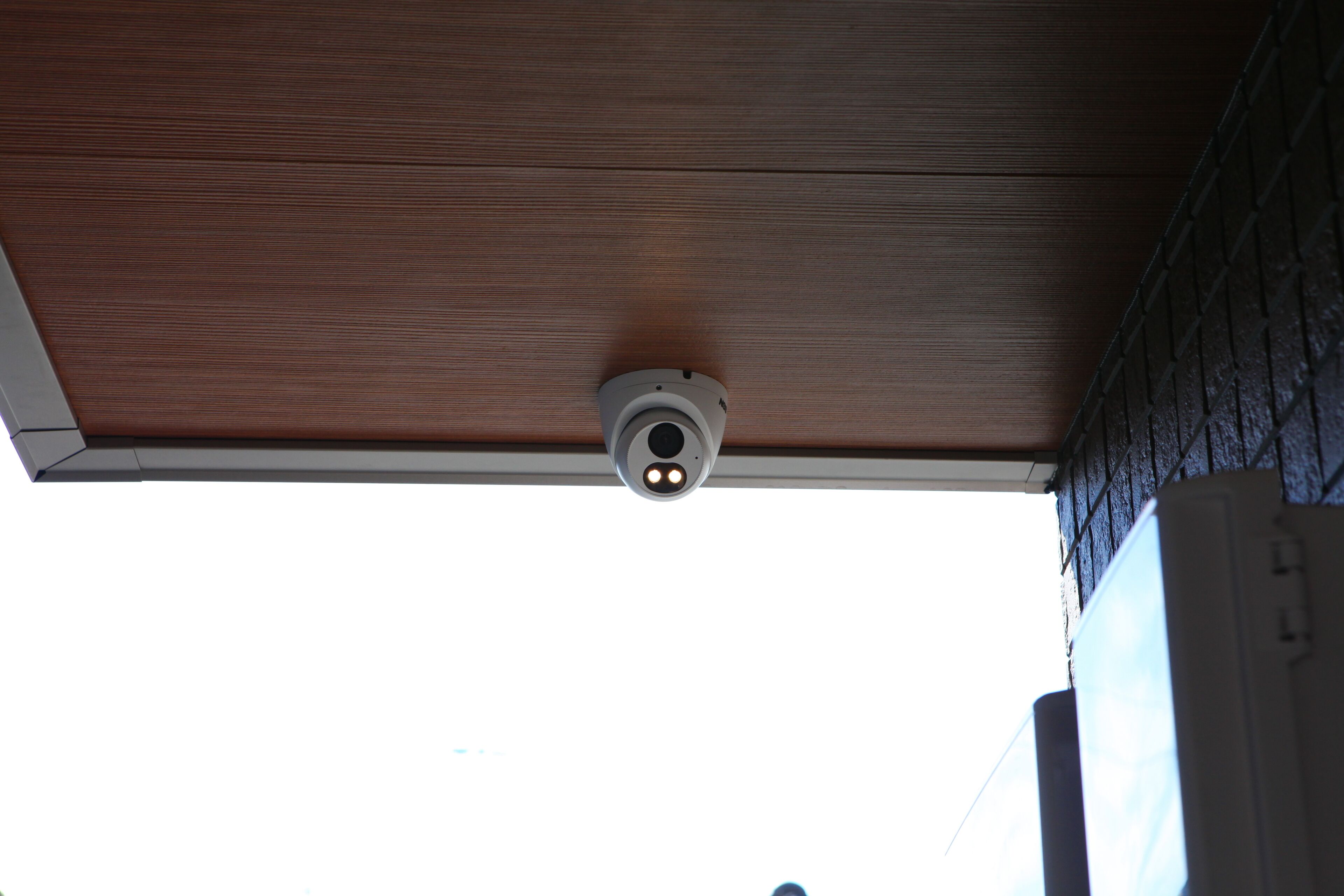A ceiling-mounted security camera.