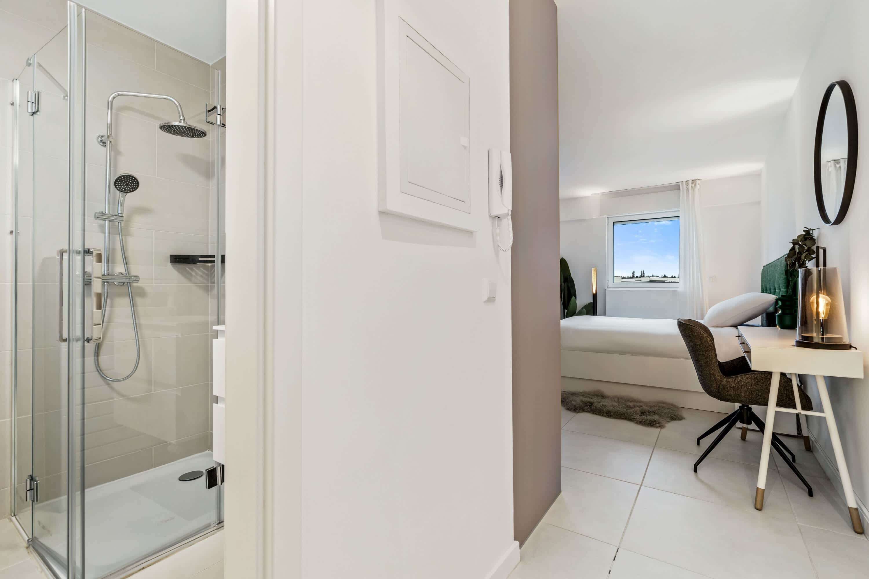 Shower, hair dryer, towels, shampoo