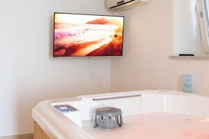 Exclusive Suite | Premium bedding, down comforters, memory foam beds, desk
