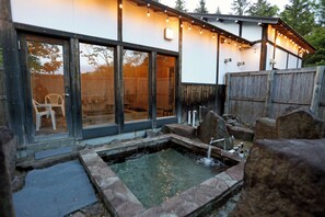 Separate tub and shower, free toiletries, hair dryer, slippers