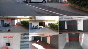 A street view with a white car parked on the side, a house entrance door, and a garage door. - Das Karma - Bruzzi (Genova)