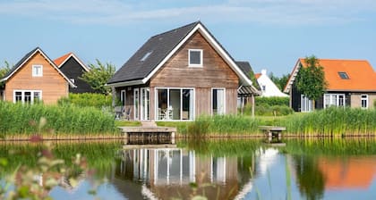 Holiday home with covered patio, sun shower and sauna