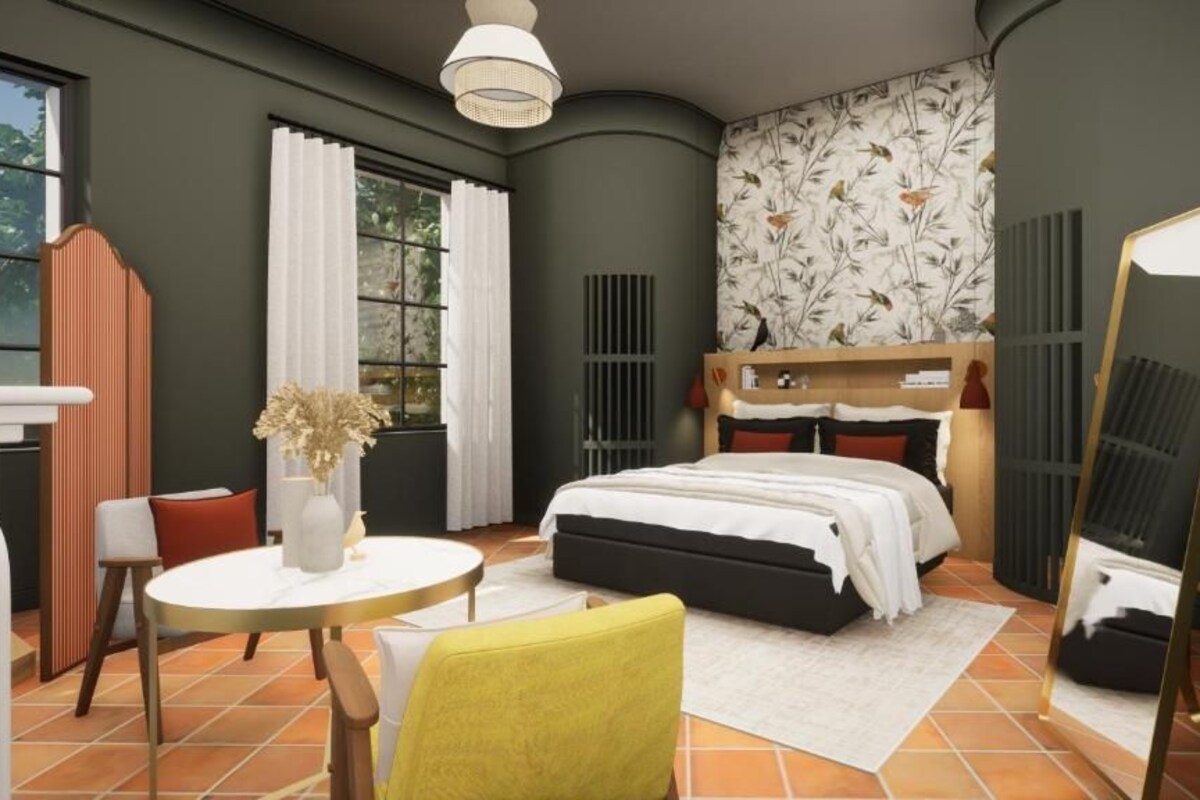 A bedroom with a bed, a bedside table, a chair, a round table, and a large mirror.