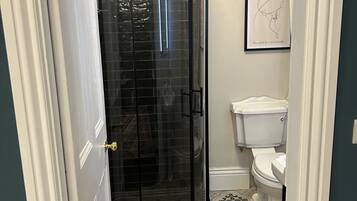 Shower, towels, soap, shampoo