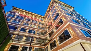 A multi-story hotel with a prominent sign reading "HOTEL CRYSTAL PASHUPATI". - Hotel Crystal Pashupati, Near Airport & Pashupatinath (Kathmandu)