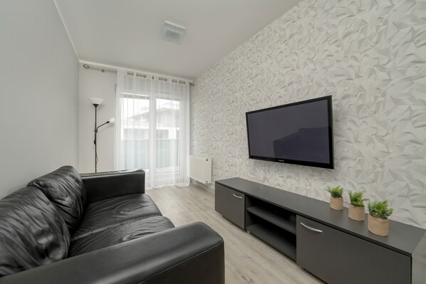 Apartment, 1 Schlafzimmer, Balkon | Wohnzimmer