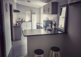 Family Cottage | Private kitchen | Full-size fridge, microwave, electric kettle, toaster