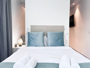 Estudio superior | Camas con efecto memoria y espacio para trabajar con laptop 