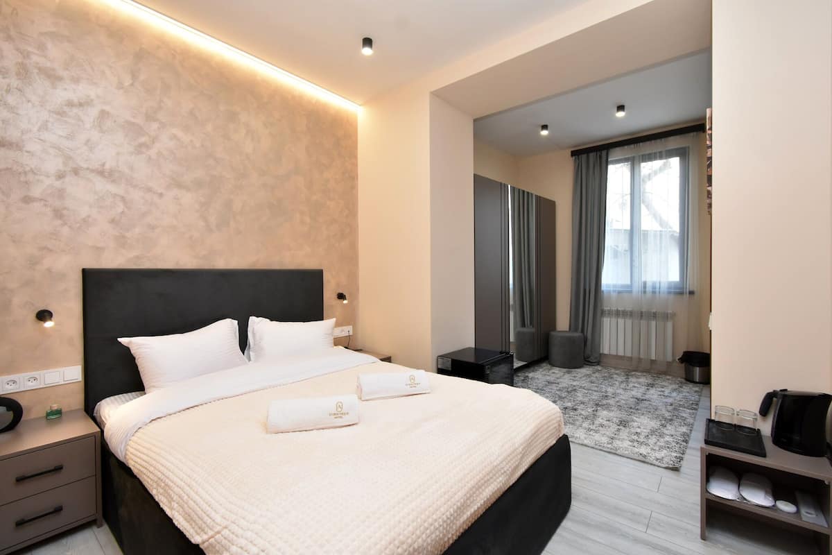 Quarto casal superior | 1 quarto, Wi-Fi de cortesia