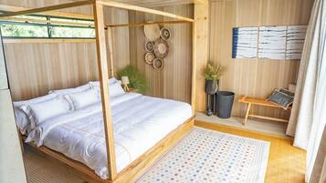 Premium bedding, down duvets, memory-foam beds, in-room safe