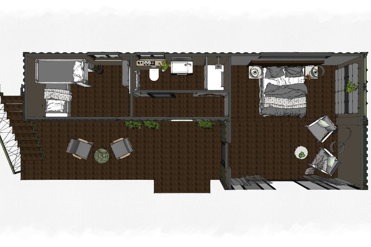 Ein zweidimensionaler Grundriss eines Hotelzimmers mit Bett, Schreibtisch, Sessel, kleinem Tisch, Sofa und Fenster.