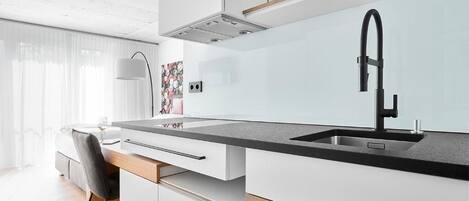 Fridge, microwave, stovetop, coffee/tea maker