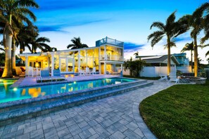 You can’t beat the pool, rooftop deck, firepit, and floor to glass ceiling views.