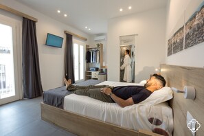 ห้องดีลักซ์ทริปเปิล, วิวเมือง | ผ้าปูที่นอนฝ้ายอียิปต์, เครื่องนอนระดับพรีเมียม, ผ้านวมขนเป็ด