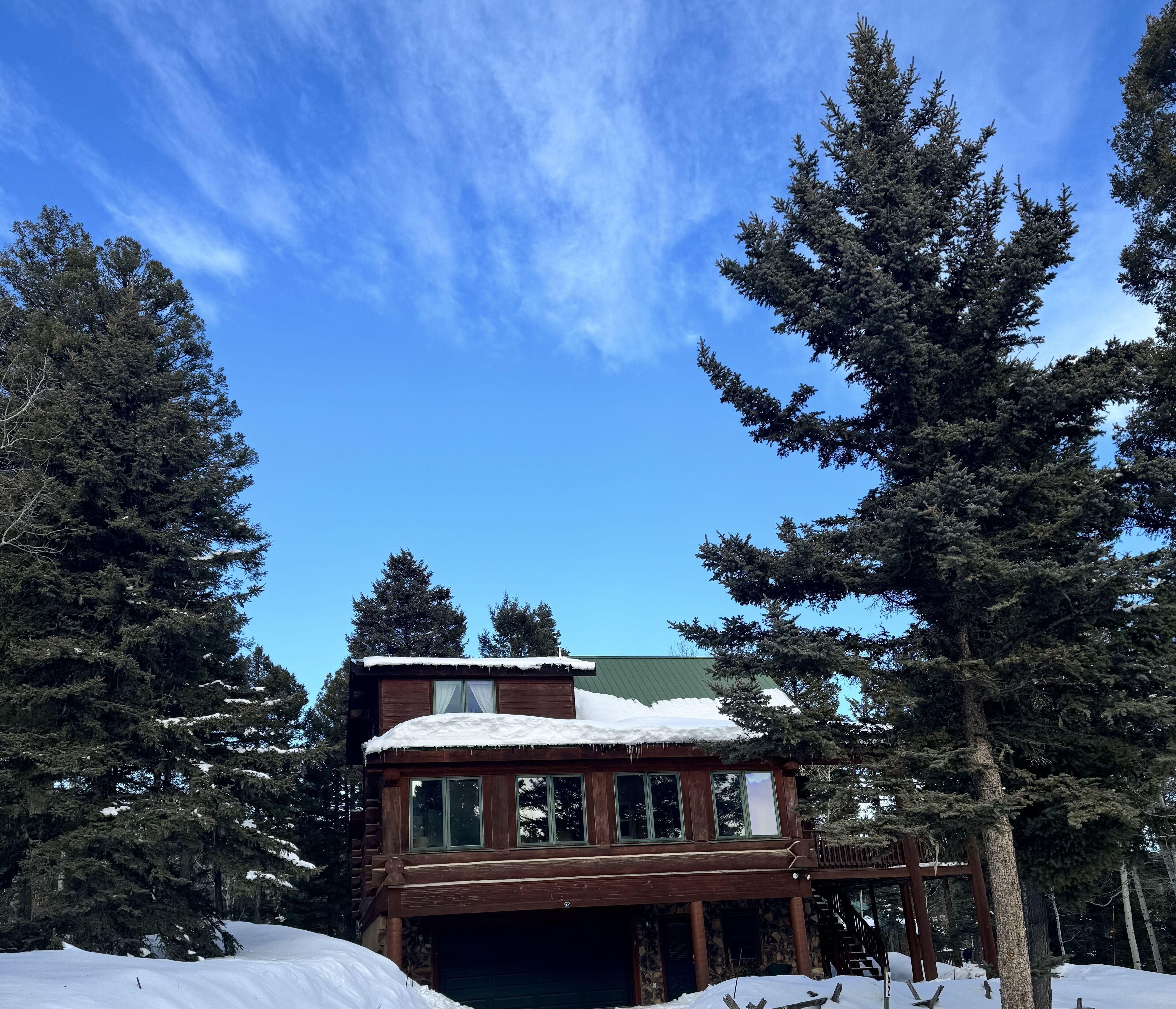 Stunning views from this 3 story log home close to skiing, hiking, golf & more!