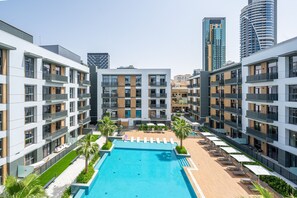 Pool - Lovely 2BR at Belgravia Square, JVC by Deluxe Holiday Homes (Dubai)